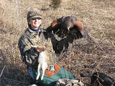 Teddy Moritz and Gripper her Harris Hawk